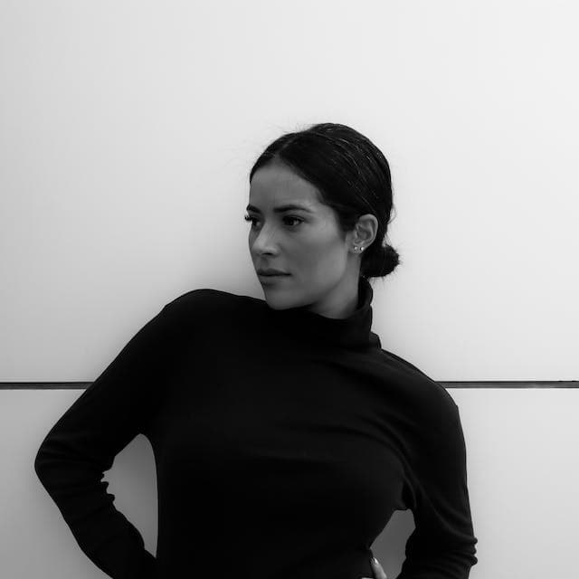 woman wearing turtleneck